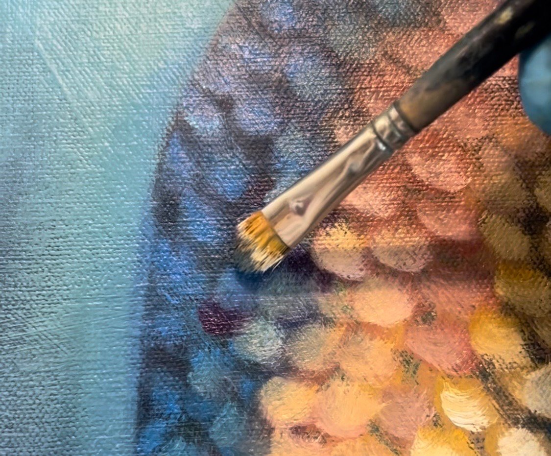 Close up painting mermaid scales