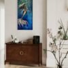 large mermaid painting in room
